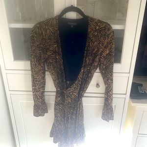 Women’s gold and black tie dress